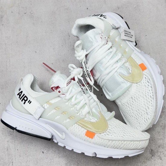 Nike Air Presto Mesh Low Top White Trainers Angled View Angled pair arrangement of Nike Air Presto Mesh Low Top White Trainers highlighting upper mesh paneling