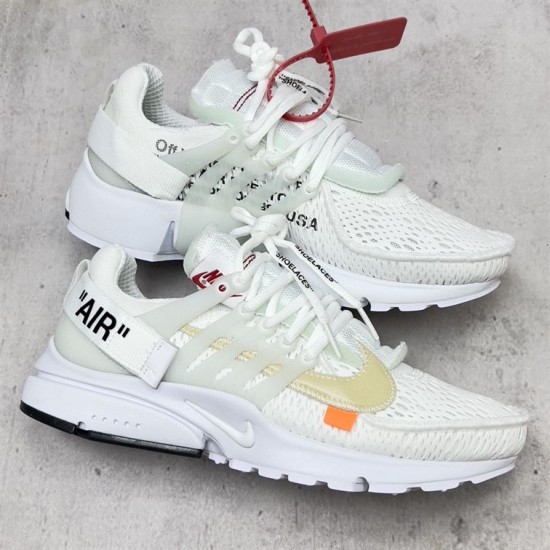 Nike Air Presto Mesh Low Top White Trainers Pair View Pair of Nike Air Presto Mesh Low Top White Trainers displayed from top angle on stone background