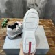 Prada Americas Cup Grey Trainers Rubber Sole View in grey and white Underside sole view displaying tread pattern and red logo strip on Prada Americas Cup grey trainers in grey and white