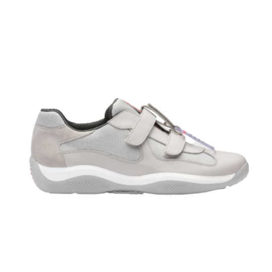 Prada Americas Cup Grey Strap Trainers Side Profile View in grey and white Side profile view of Prada Americas Cup grey strap leather low top trainers showing mesh panels and white sole