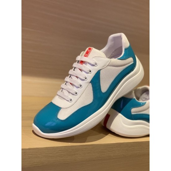 Angled front view of Prada America's Cup blue and white trainer showing lace detail