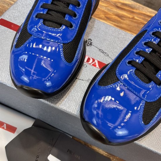 Prada America's Cup Toe Detail in blue and black Close-up of glossy blue patent leather toe cap and black mesh overlay