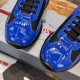 Prada America's Cup Toe Detail in blue and black Close-up of glossy blue patent leather toe cap and black mesh overlay