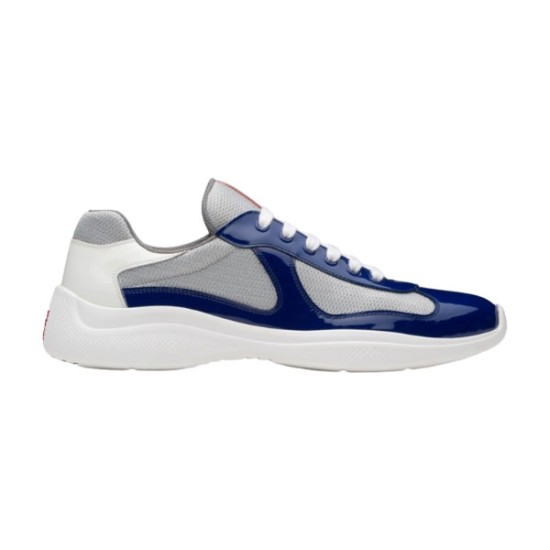Prada America's Cup Blue Grey Trainer Side View Side profile view of Prada America's Cup patent mesh trainer in blue and grey