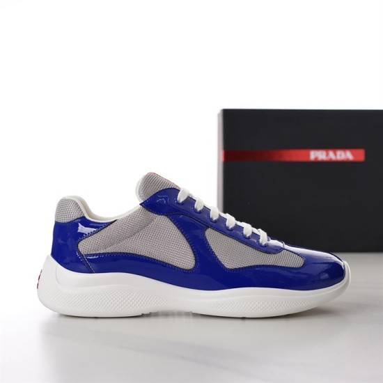 Prada America's Cup Lateral Profile View in blue and grey Lateral side view of Prada patent leather and mesh trainer in royal blue and grey