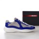 Prada America's Cup Lateral Profile View in blue and grey Lateral side view of Prada patent leather and mesh trainer in royal blue and grey