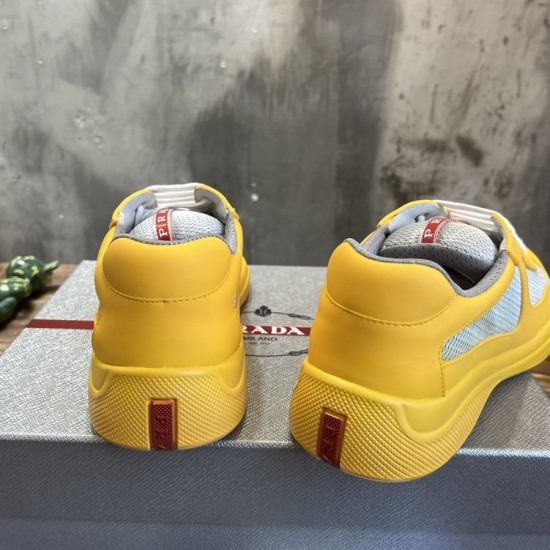 Rear view showing heel counters with iconic red Prada logo strips in yellow and grey