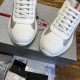 Overhead toe box view of white and grey Prada America's Cup trainers
