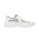 Side profile view of Prada America's Cup trainer in white and grey
