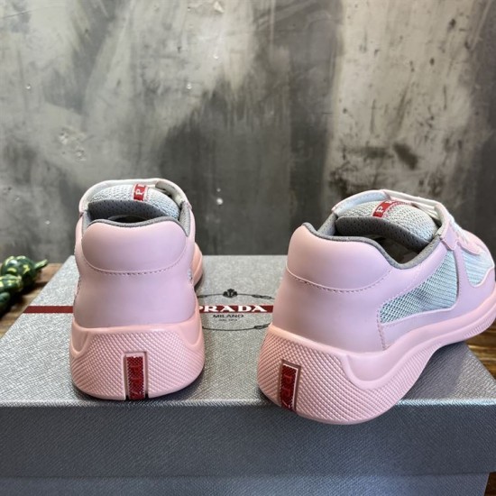 Rear view displaying pink heels with red logo vertical stripes in pink and grey