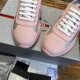 Close-up of pink toe cap overlay and grey mesh toe box