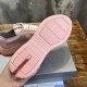 Tread pattern on the pink rubber outsole with red logo branding insert in pink and grey