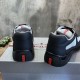 Heel View Prada Trainers in black and grey Rear heel view showing black rubber heel counters and red logo tabs in black and grey