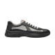 Profile View Prada America's Cup Trainer in black and grey Studio profile shot of Prada America's Cup trainer in black soft rubber and grey mesh