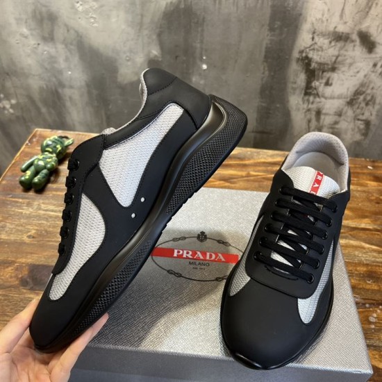 Medial View Prada America's Cup Trainer in black and grey Medial side and top angle view of black and grey Prada America's Cup trainer