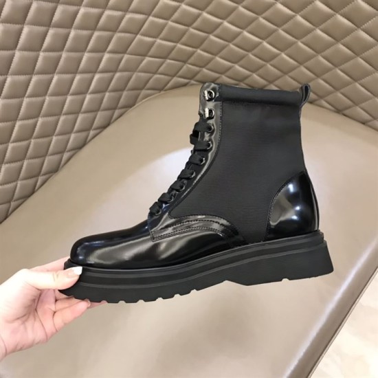Prada Black Boot Medial Side in black and white Medial side view of black Prada brushed leather and nylon boot showcasing lugged rubber sole in black and white