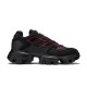 Prada Cloudbust Thunder Trainers Side View in black and red Side profile of Prada Cloudbust Thunder technical fabric trainers in black with red overlays