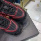 Prada Cloudbust Thunder Toe Box Detail in black and red Detailed view of red linear rubber accents on the toe box of Prada trainers in black and red