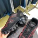 Prada Cloudbust Thunder Trainer Profile Detail in black and red Side elevation of black Prada trainer showing thick sculpted tread sole and red accents