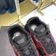 Prada Cloudbust Thunder Tongue and Lining Detail in black and red Close-up of padded collar and tongue branding on black and red Prada trainers