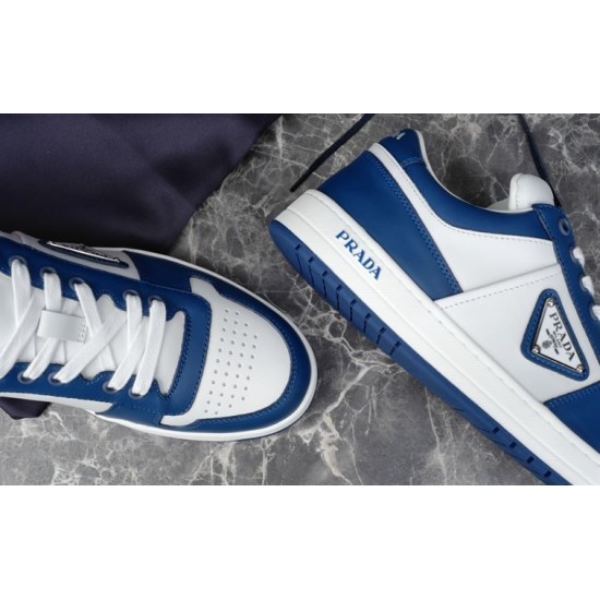 Prada Downtown Blue White Trainer Eyelet and Sole Detail Close-up of Prada Downtown trainer lace eyelets and blue sole edge in blue and white