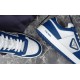 Prada Downtown Blue White Trainer Eyelet and Sole Detail Close-up of Prada Downtown trainer lace eyelets and blue sole edge in blue and white