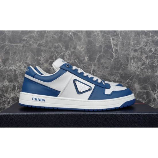 Prada Downtown Blue White Trainer Side View Prada Downtown blue and white trainer side view resting on shoe box