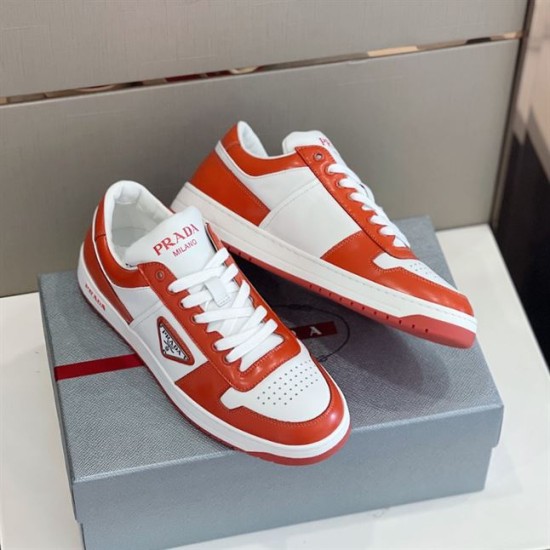 Top Angled View of Prada Downtown Trainers in orange and white Top angled view of Prada Downtown leather trainers in orange and white