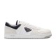 Prada Downtown Re-Nylon White And Navy Low-Top Trainer Side View Prada Downtown Re-Nylon white and navy low-top trainer side view on a white background