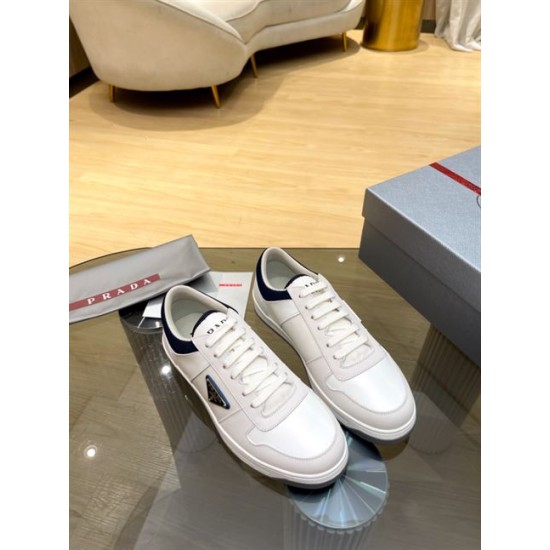 Prada White And Navy Low-Top Trainers Top View Top-down view of Prada white and navy low-top trainers showing lace arrangement