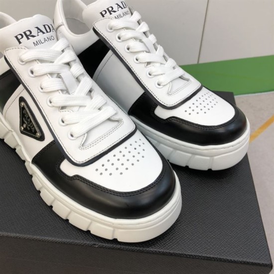 Prada Leather Low Top Trainers In Black And White - Toe Box Detail Close-up of perforated toe and lace structure on Prada black and white trainers