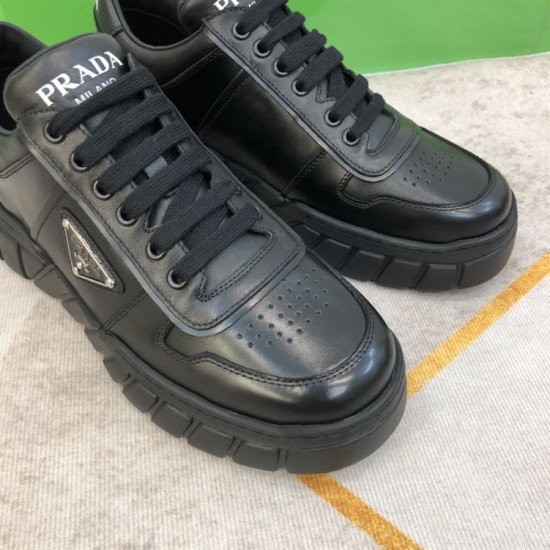 Prada Black Leather Trainer Toe Box and Laces Detail Close-up angled view of toe box, laces, and side logo on Prada black leather trainer