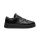 Prada Black Leather Low Top Trainer Side Profile Side profile view of Prada black leather low top chunky trainer showing enamel triangle logo