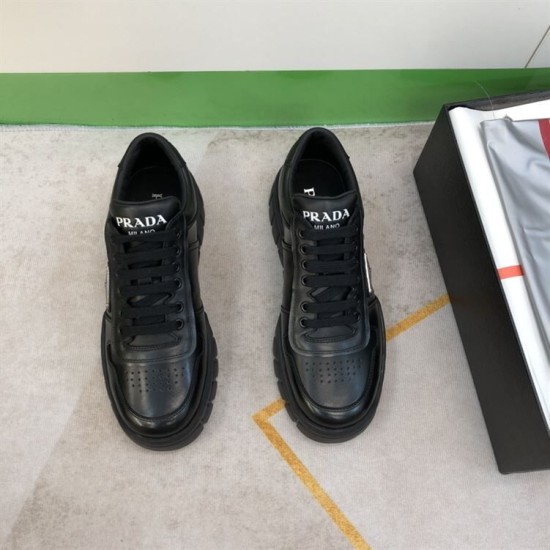 Prada Black Leather Trainers Front Top View Front overhead view showing tongue logo and lace closure on Prada black trainers