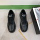 Prada Black Leather Trainers Front Top View Front overhead view showing tongue logo and lace closure on Prada black trainers