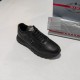 Single Prada Black Leather Low Top Trainer Three-Quarter View Single Prada Black Leather Low Top Trainer three-quarter view