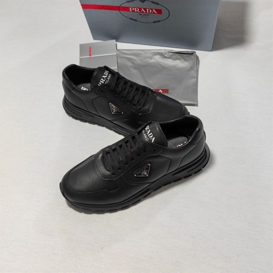 Prada Black Leather Low Top Trainers Front Angle Prada Black Leather Low Top Trainers angled front view showing triangle emblem