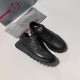 Prada Black Leather Low Top Trainers with Accessories Prada Black Leather Low Top Trainers full view alongside designer box and accessories
