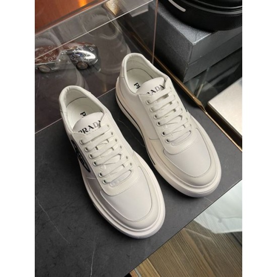 Prada Low-Top Platform Trainers Top View in off-white Top-down view of off-white Prada low-top platform trainers showing laces