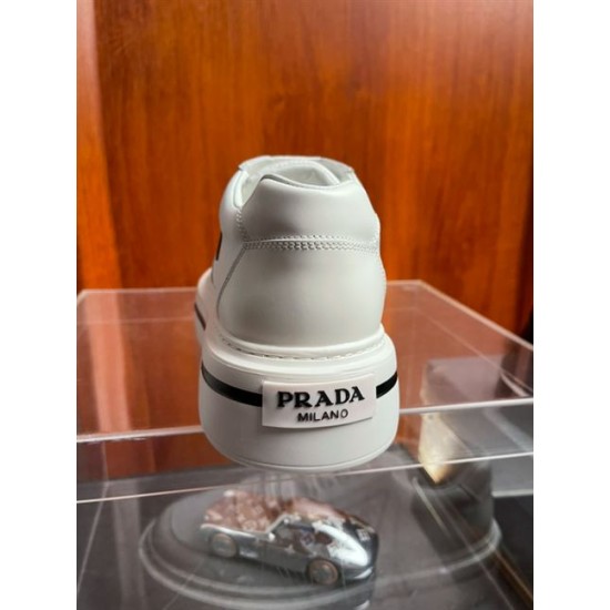 Prada Platform Trainer Heel View in off-white Heel view of off-white Prada platform trainer showing heel badge