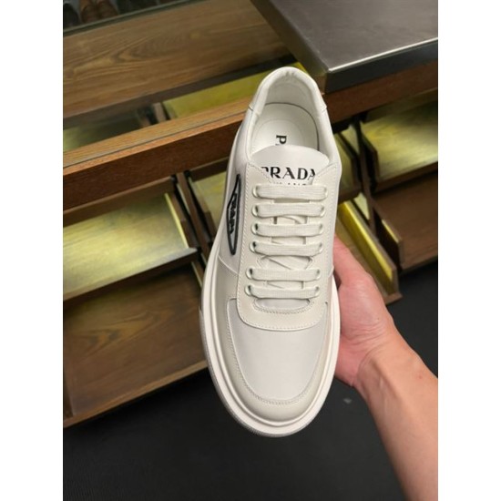 Prada Macro Trainer Top Perspective in off-white Top perspective of off-white Prada Macro trainer held in hand