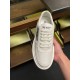 Prada Macro Trainer Top Perspective in off-white Top perspective of off-white Prada Macro trainer held in hand