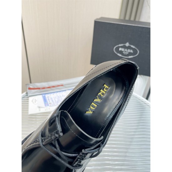 Prada Monolith Shoes Inner Logo Detail in black Detailed interior shot showing gold-tone Prada logo branding inside black shoe