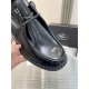 Prada Monolith Shoes Apron Toe Stitch Detail in black Close-up detail of the apron toe stitching on black Prada brushed leather shoes