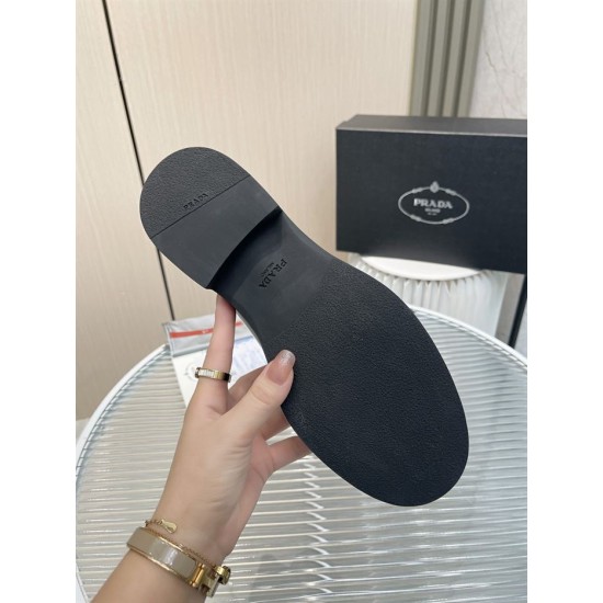 Prada Monolith Shoes Bottom Sole View in black Bottom view showing the tread and branded sole of black Prada lace-up shoes
