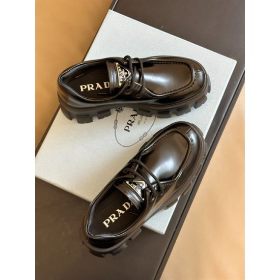 Overhead view of pair of black Prada Monolith leather shoes