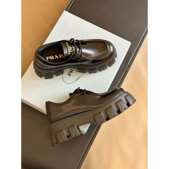 Pair of black Prada Monolith shoes highlighting chunky lug soles