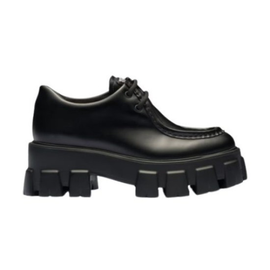 Profile shot of black Prada Monolith brushed leather shoe on white background