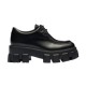 Profile shot of black Prada Monolith brushed leather shoe on white background