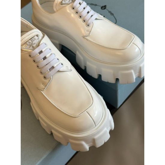 Prada Monolith White Upper Close-Up View Close-up of white brushed leather upper and laces on Prada Monolith shoe